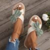 776b04cf-156f-41a6-bfd6-51cbadbf82e9.jpg Lightweight And Breathable Slides with an Open Toe Design